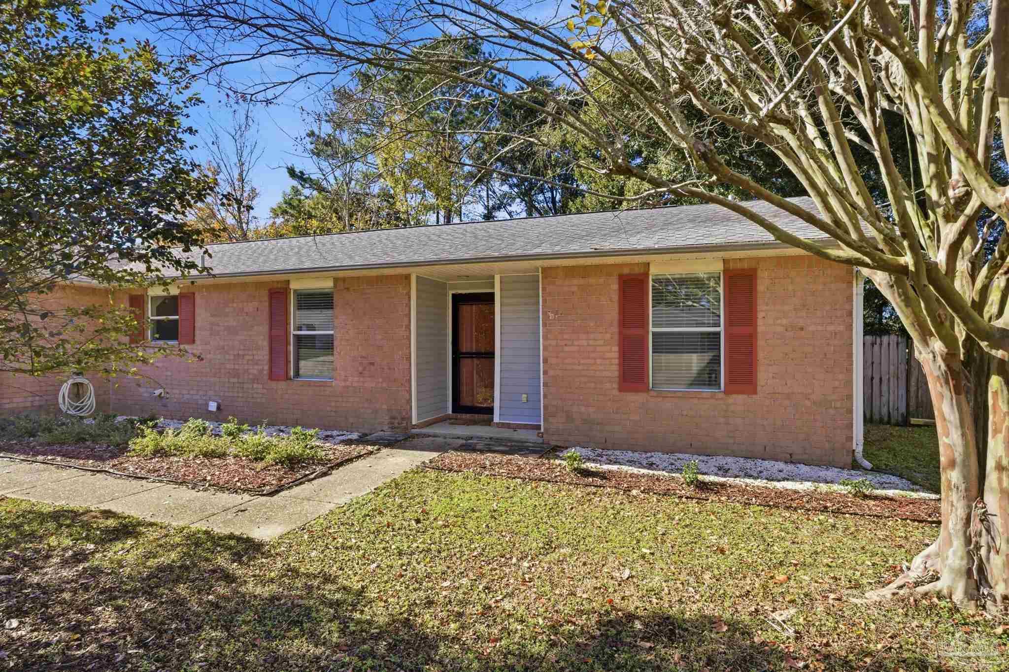 4331 Chantilly Way Milton, FL 32583 - Photo 25 of 30 a view of a house with a yard