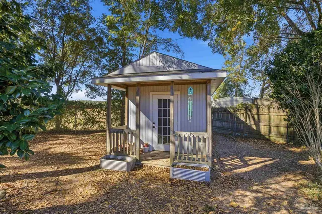 a front view of a house with a porch
