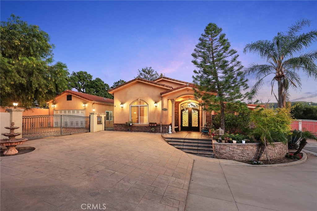 10610 Oak Tree Way Sunland, CA 91040 - Photo 1 of 63 a view of a house with a yard and potted plants