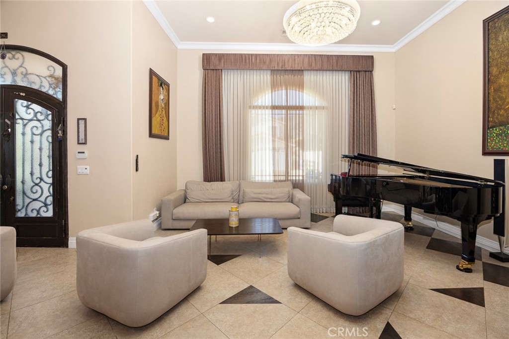 10610 Oak Tree Way Sunland, CA 91040 - Photo 16 of 63 a living room with furniture and a large window