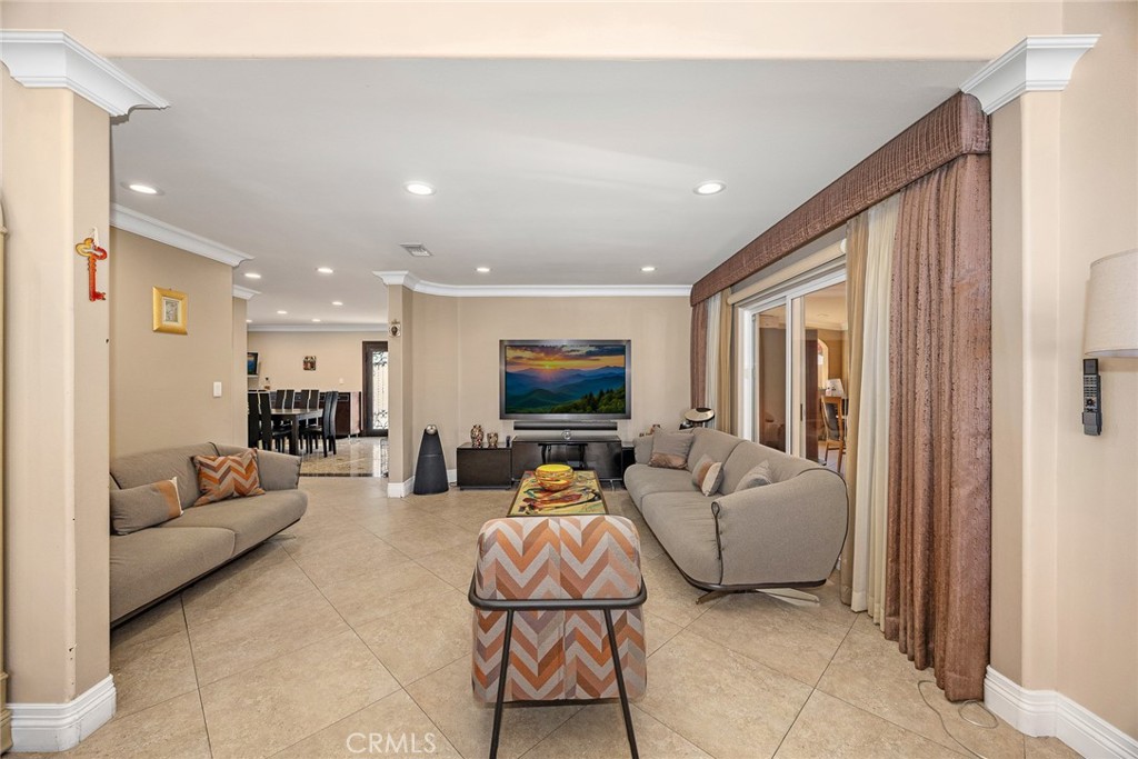 10610 Oak Tree Way Sunland, CA 91040 - Photo 17 of 63 a living room with furniture and a flat screen tv