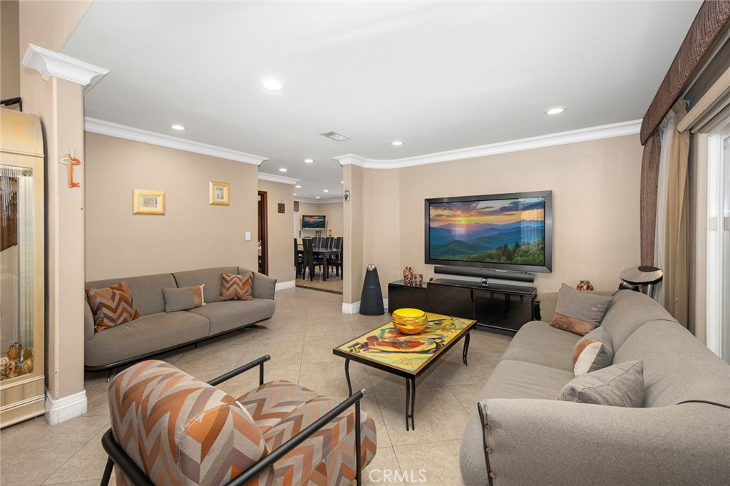 10610 Oak Tree Way Sunland, CA 91040 - Photo 18 of 63 a living room with furniture and a flat screen tv