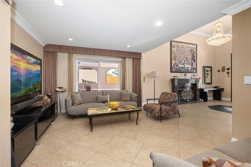 10610 Oak Tree Way Sunland, CA 91040 - Photo 19 of 63 a living room with furniture and a flat screen tv