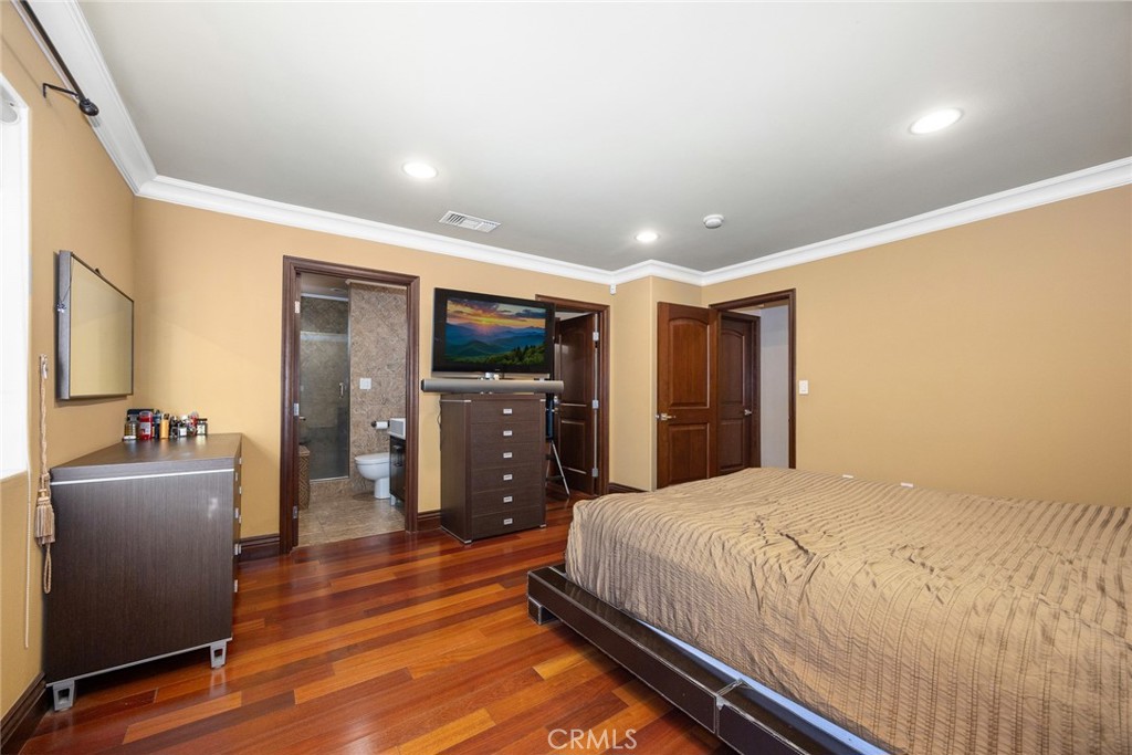 10610 Oak Tree Way Sunland, CA 91040 - Photo 30 of 63 a bedroom with a bed and a television