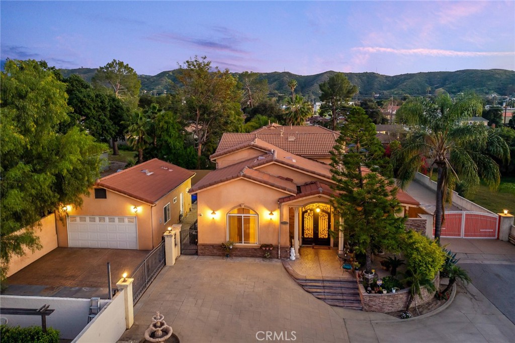 10610 Oak Tree Way Sunland, CA 91040 - Photo 4 of 63 a view of a large building with a mountain in the background