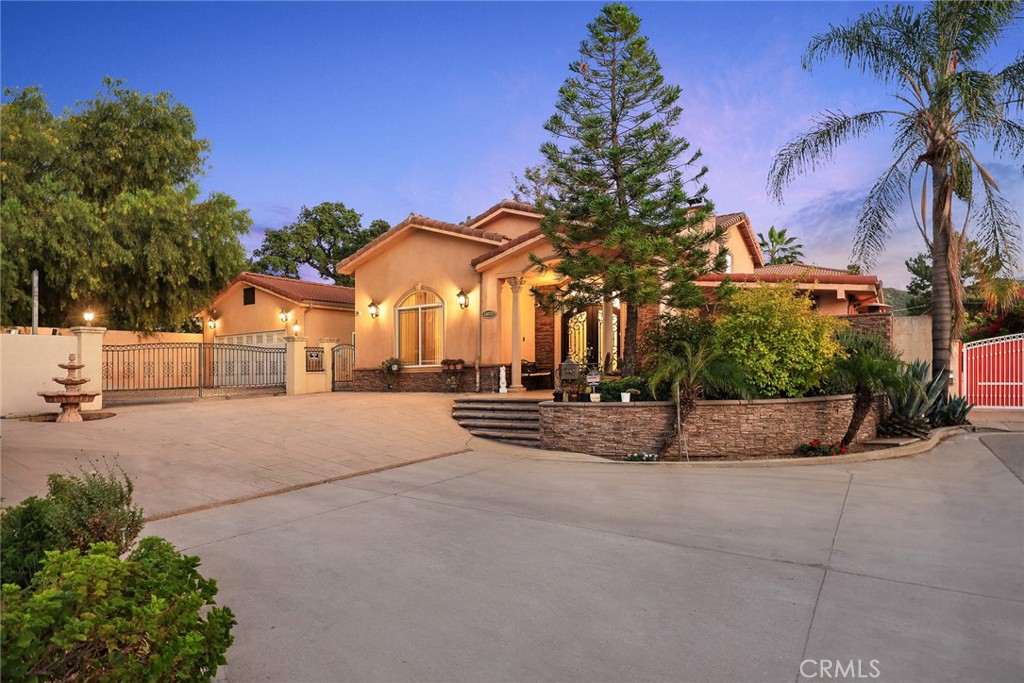 10610 Oak Tree Way Sunland, CA 91040 - Photo 5 of 63 a view of a street with a building in the background