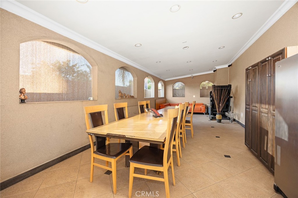 10610 Oak Tree Way Sunland, CA 91040 - Photo 52 of 63 a dining room with furniture and window