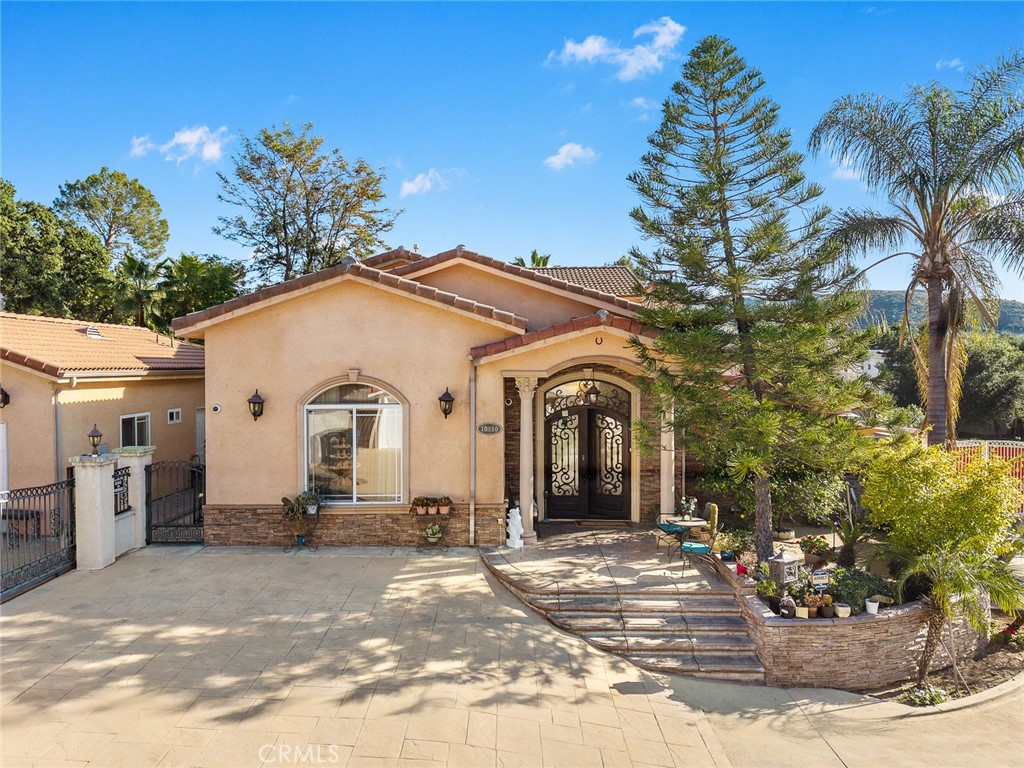 10610 Oak Tree Way Sunland, CA 91040 - Photo 9 of 63 a view of a white house with a yard