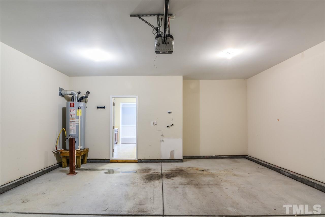 3630 Eastern Branch Road Raleigh, NC 27610 - Photo 23 of 25 an empty room with a ceiling fan