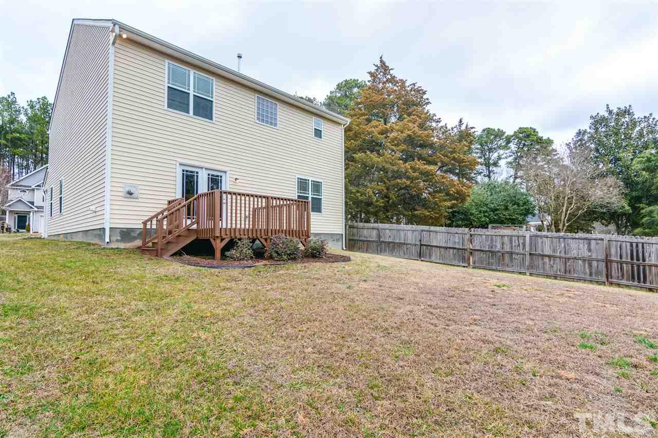 3630 Eastern Branch Road Raleigh, NC 27610 - Photo 6 of 25 a view of backyard with small cabin