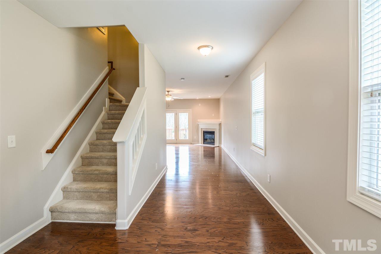 3630 Eastern Branch Road Raleigh, NC 27610 - Photo 8 of 25 a view of entryway and hall with wooden floor