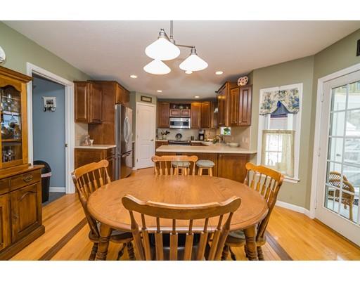 44 Old Reed Road Monson, MA 01057 - Photo 11 of 30 a view of a dining room with furniture and wooden floor