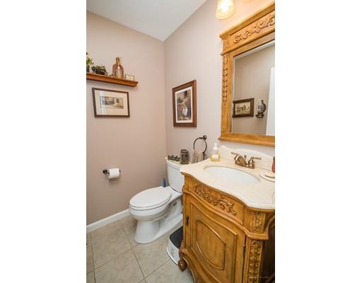 44 Old Reed Road Monson, MA 01057 - Photo 13 of 30 a bathroom with a sink a toilet and mirror