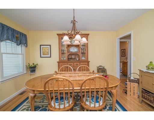 44 Old Reed Road Monson, MA 01057 - Photo 15 of 30 a picture of a dining room with furniture window and wooden floor
