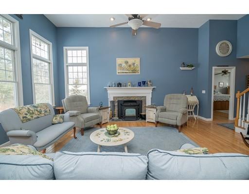 44 Old Reed Road Monson, MA 01057 - Photo 2 of 30 a living room with furniture and a fireplace