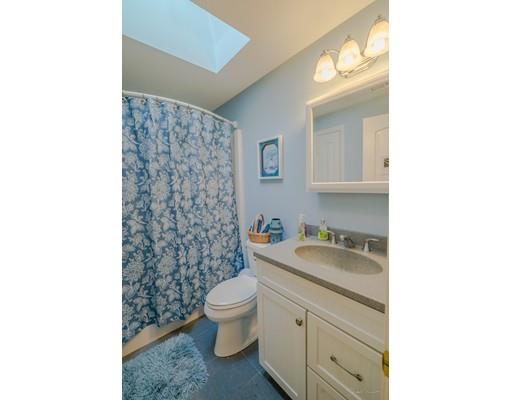 44 Old Reed Road Monson, MA 01057 - Photo 25 of 30 a bathroom with a granite countertop toilet sink and mirror