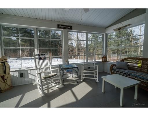 44 Old Reed Road Monson, MA 01057 - Photo 27 of 30 a living room with furniture and a floor to ceiling window