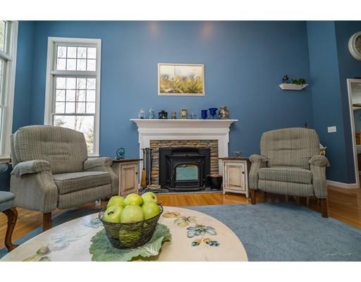 44 Old Reed Road Monson, MA 01057 - Photo 7 of 30 a living room with furniture a window and a fireplace