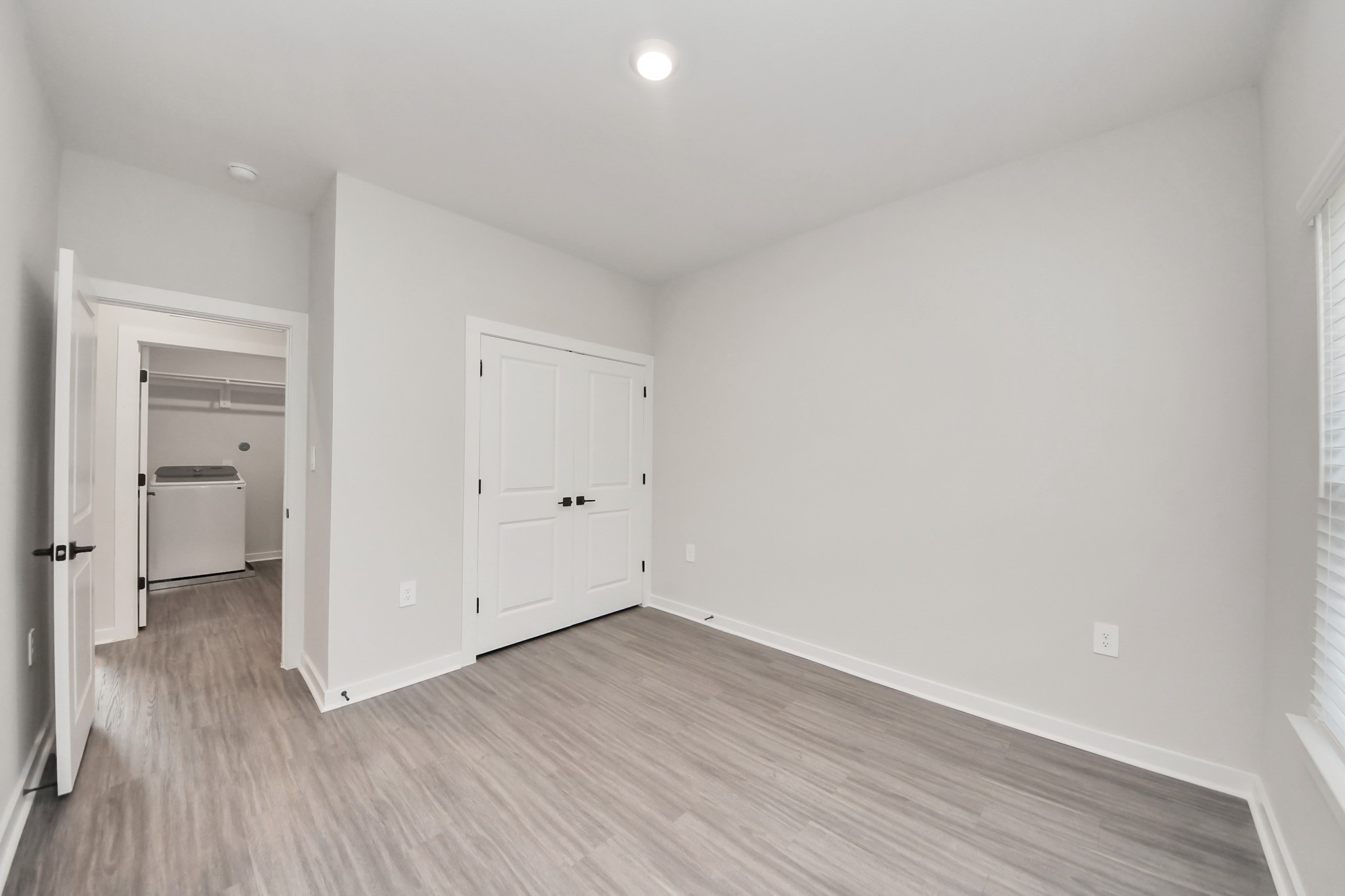 7711 Longmire Road, Unit 102 Conroe, TX 77304 - Photo 9 of 48 Bedroom 2 with Closet
