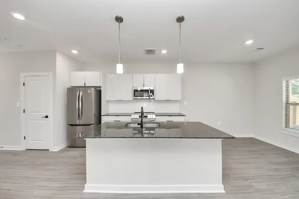 $1,694 | 7711 Longmire Road, Unit 102, Conroe, TX 77304