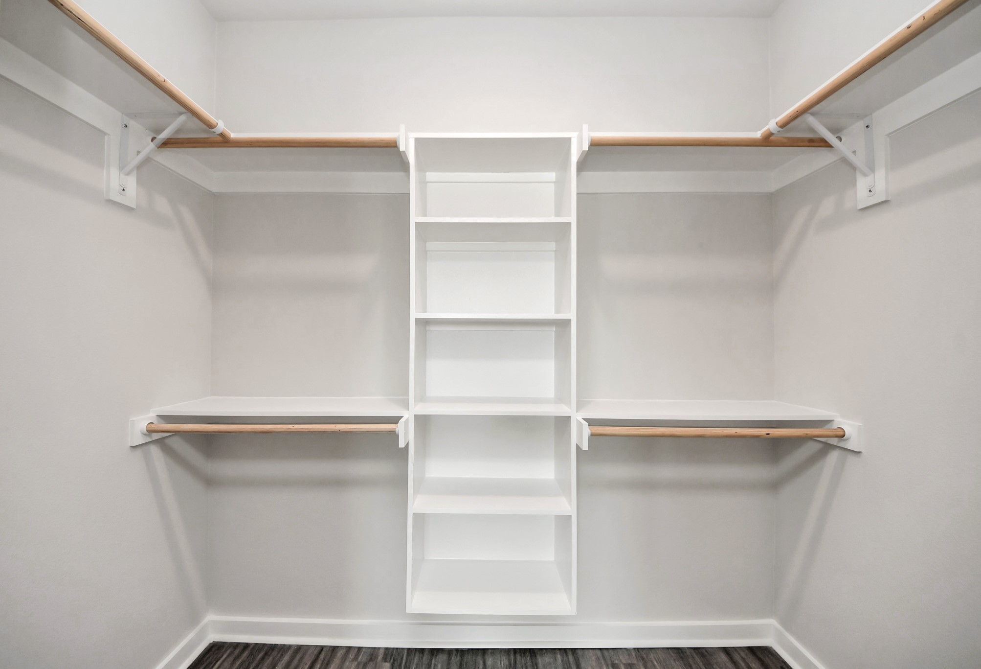 7711 Longmire Road, Unit 102 Conroe, TX 77304 - Photo 18 of 48 a view of walk in closet with empty racks