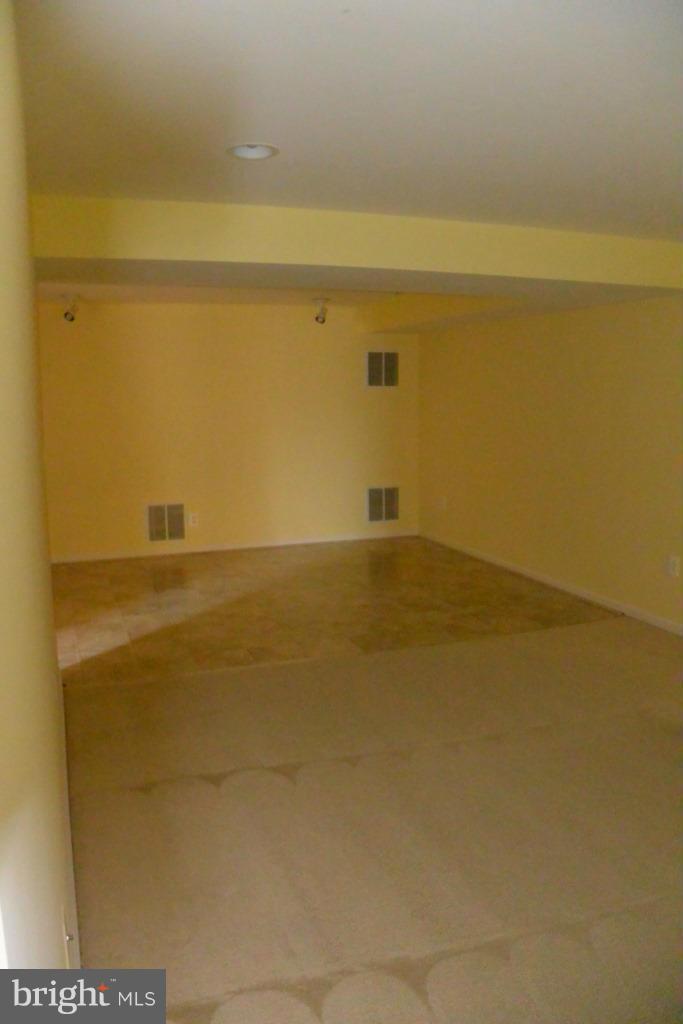16526 Reservoir Loop Dumfries, VA 22026 - Photo 24 of 28 Basement Rec. Room