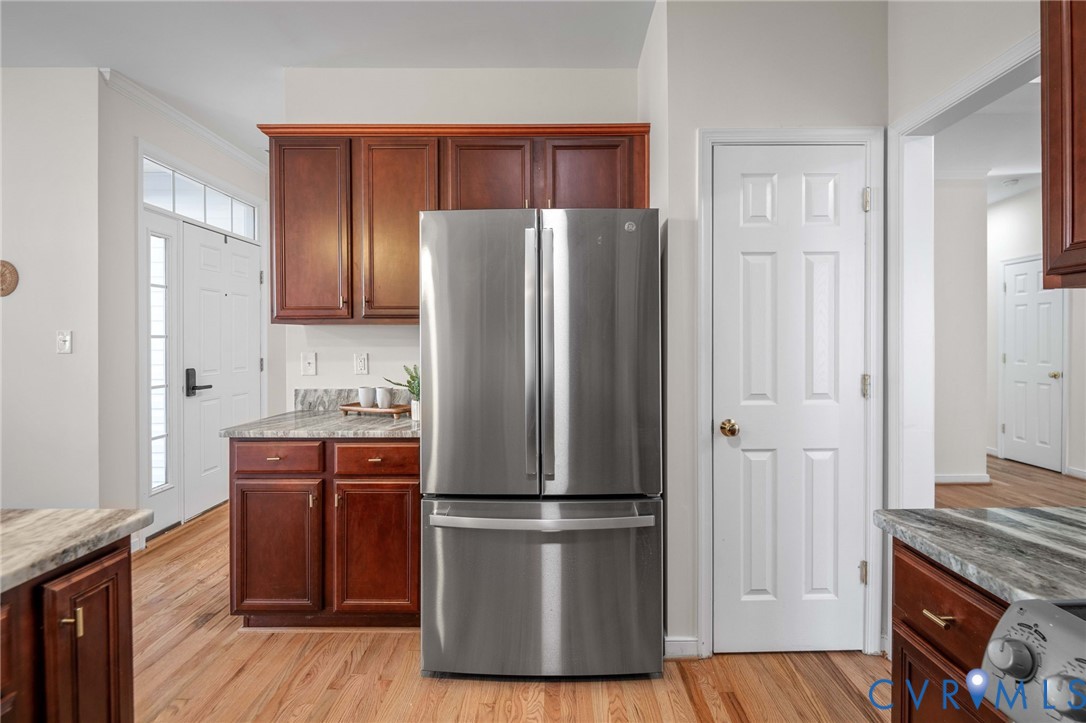 1024 Alcorn Terrace Midlothian, VA 23114 - Photo 16 of 50 a kitchen with stainless steel appliances granite countertop a refrigerator and a stove