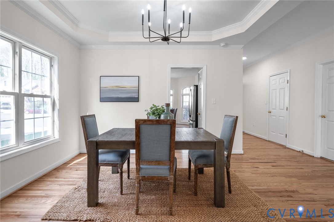 1024 Alcorn Terrace Midlothian, VA 23114 - Photo 18 of 50 a view of a dining room with furniture window and wooden floor