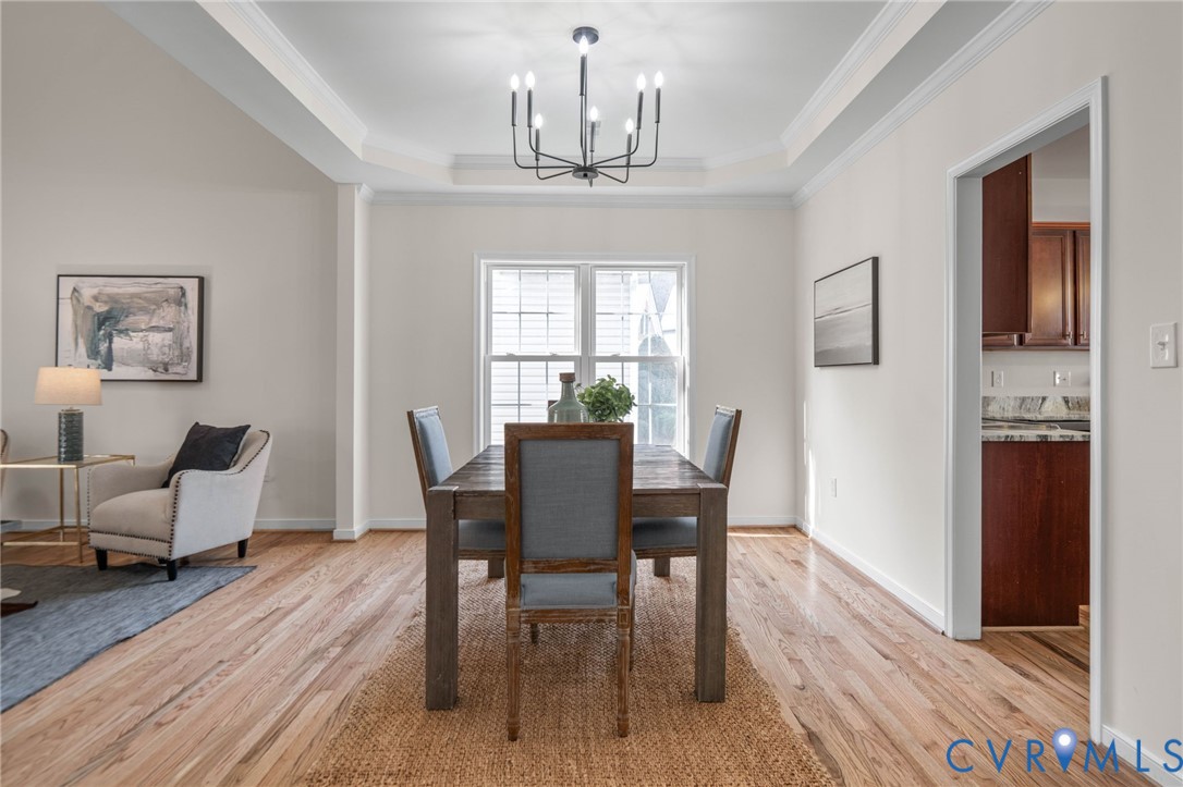 1024 Alcorn Terrace Midlothian, VA 23114 - Photo 19 of 50 a view of a dining room with furniture window and wooden floor