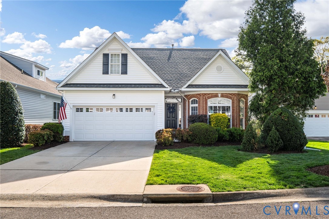 1024 Alcorn Terrace Midlothian, VA 23114 - Photo 2 of 50 a front view of a house with garden