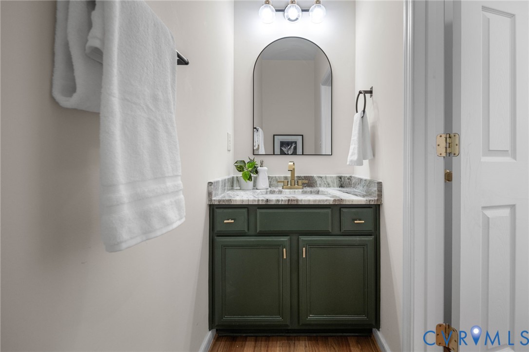 1024 Alcorn Terrace Midlothian, VA 23114 - Photo 28 of 50 a bathroom with a sink and a mirror