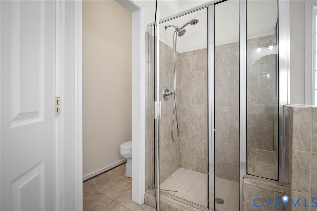 1024 Alcorn Terrace Midlothian, VA 23114 - Photo 33 of 50 a bathroom with a shower and a glass door