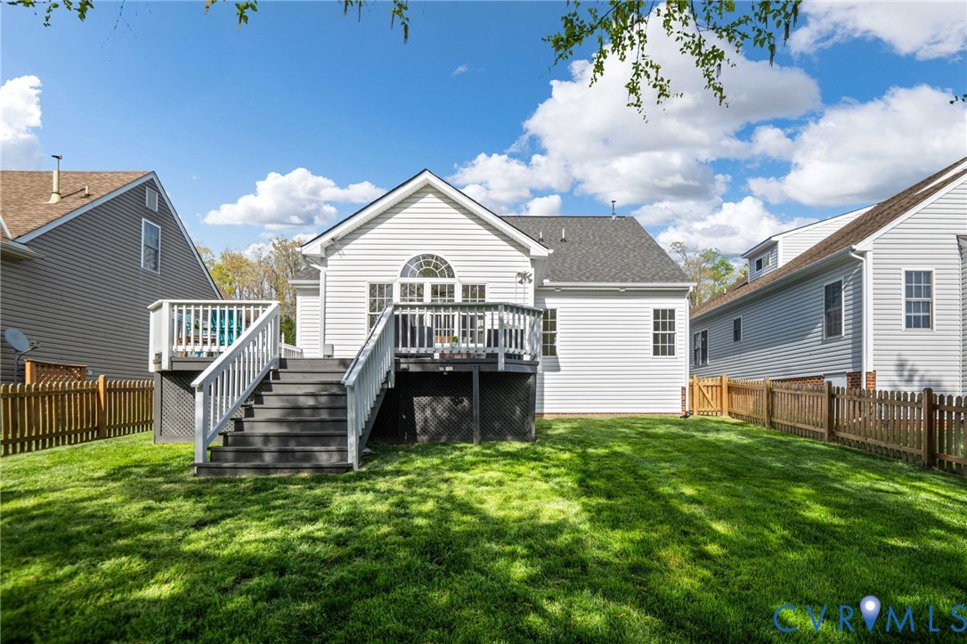 1024 Alcorn Terrace Midlothian, VA 23114 - Photo 46 of 50 a front view of a house with a yard table and chairs