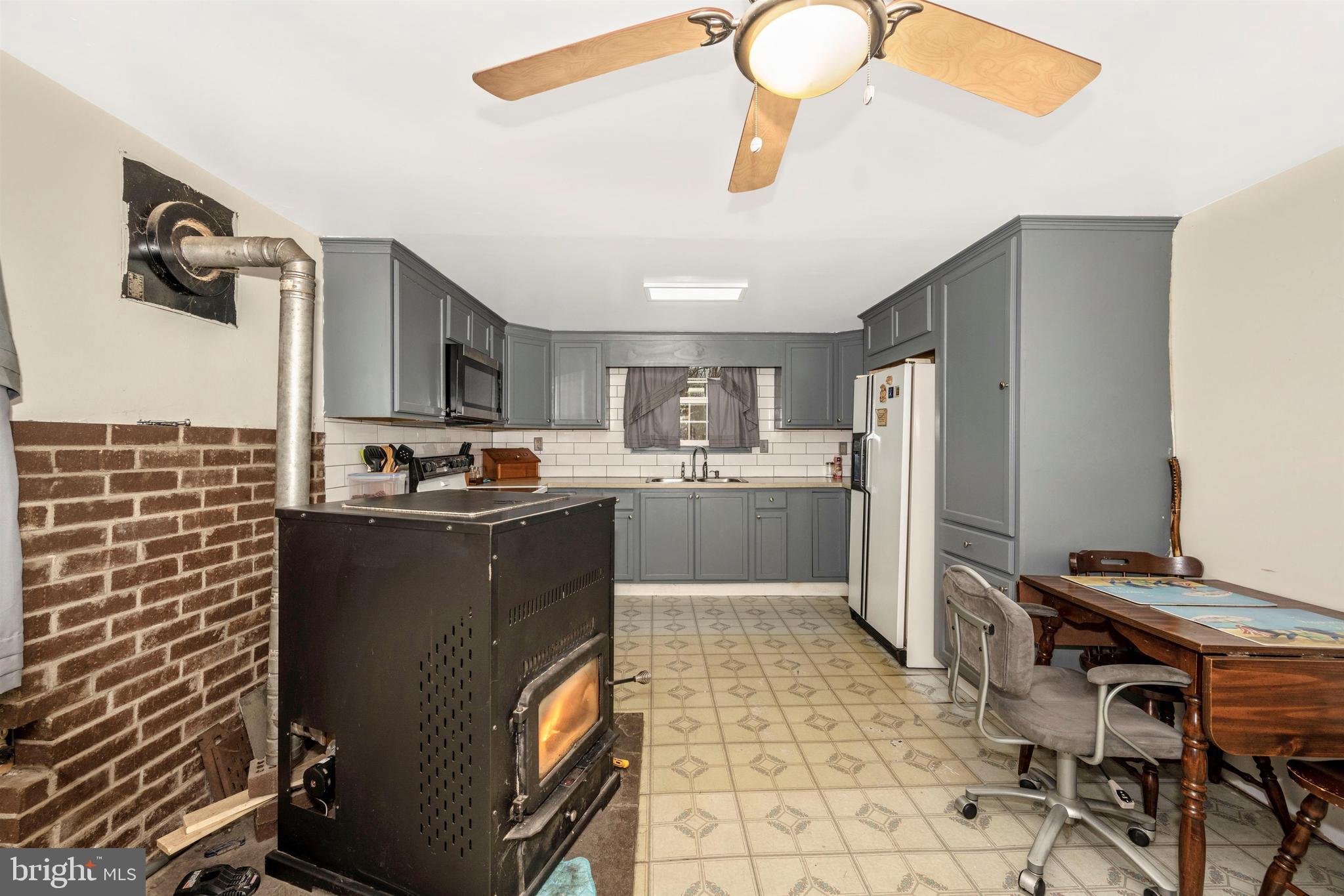 3813 Basford Road Frederick, MD 21703 - Photo 24 of 40 Large and warm pellet stove