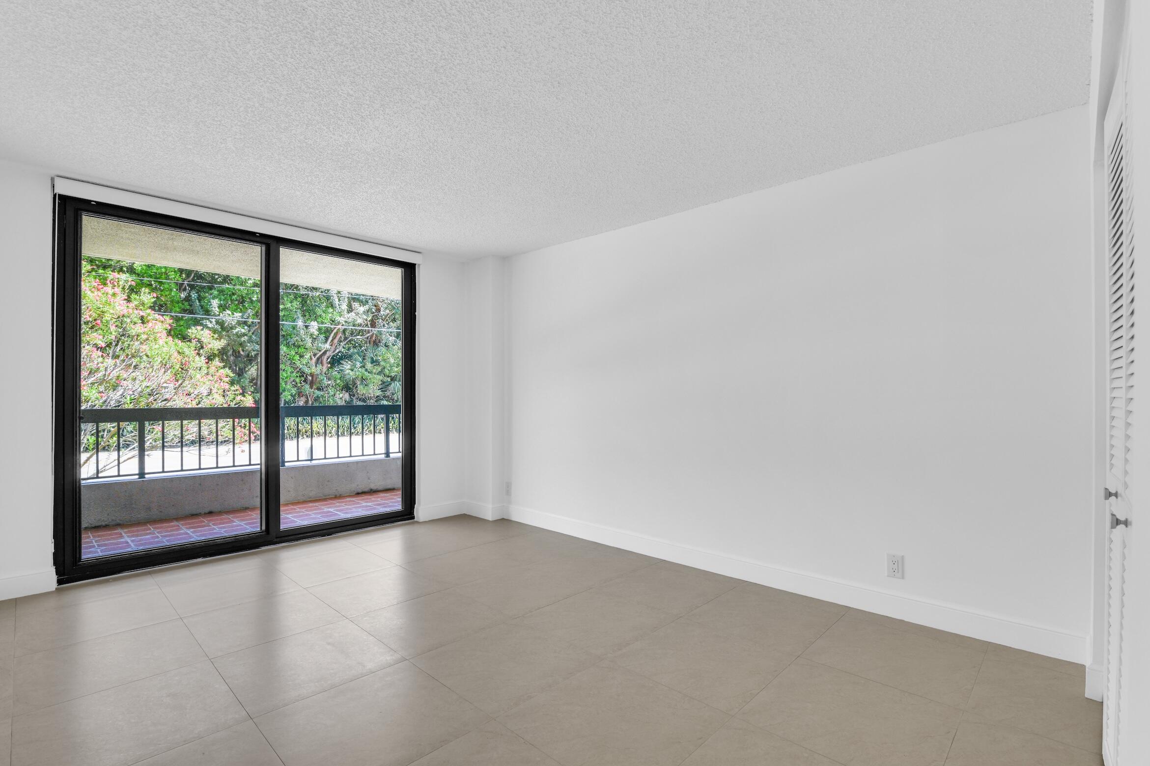 277 North Ocean Boulevard, Unit 1010 Boca Raton, FL 33432 - Photo 13 of 30 a view of an empty room with a window