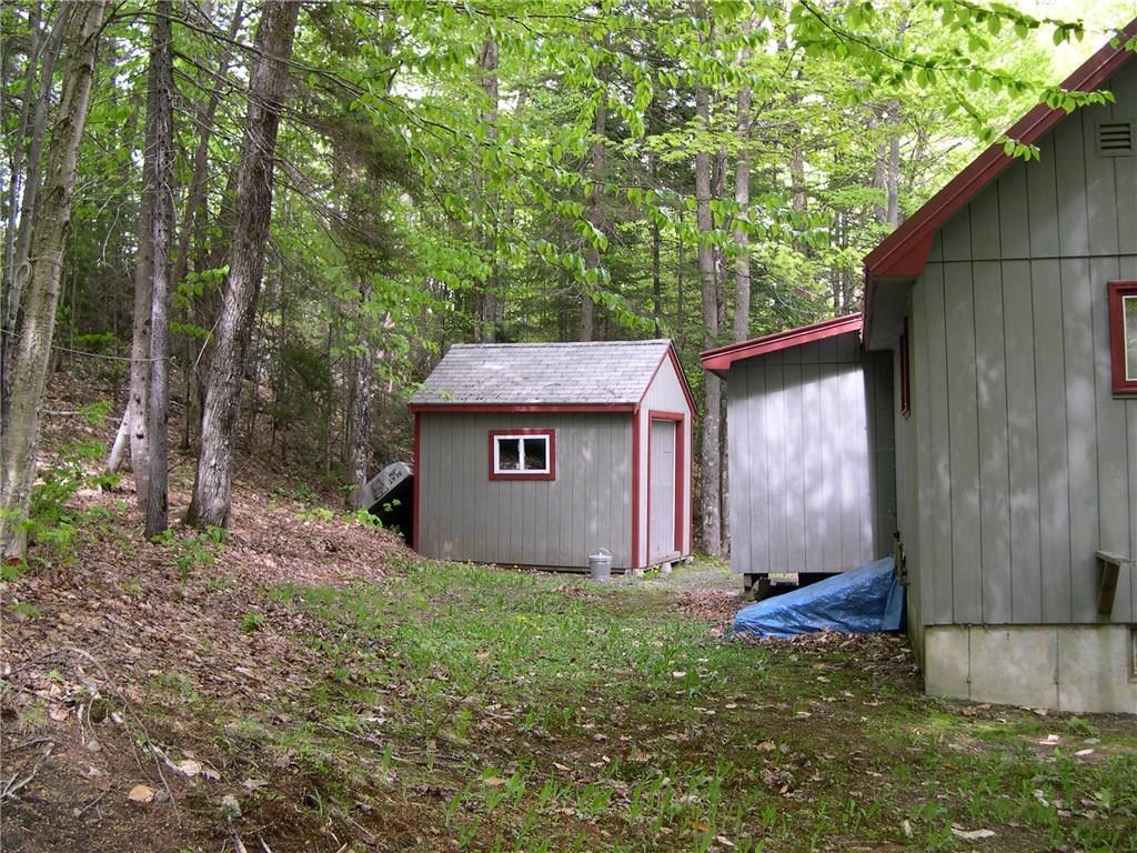 191 Edelheid Road Sandy River Plt, ME 04970 - Photo 19 of 27 storage shed, basement bulk head