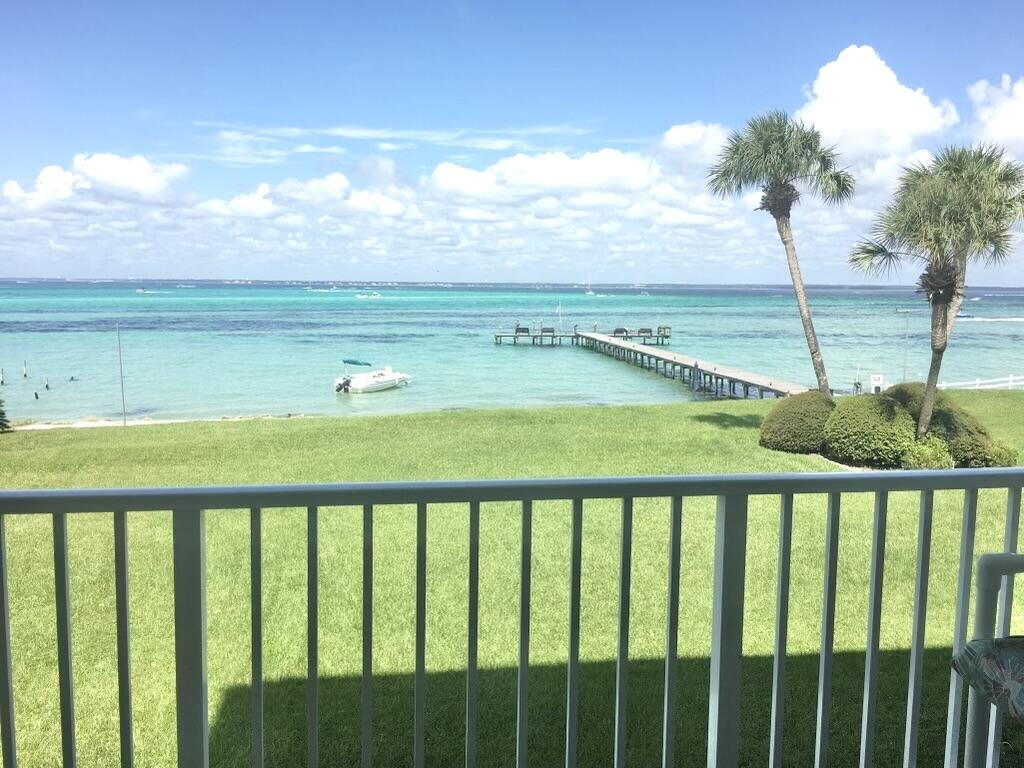 151 Calhoun Avenue, Unit 201 Destin, FL 32541 - Photo 1 of 55 a balcony with an ocean view