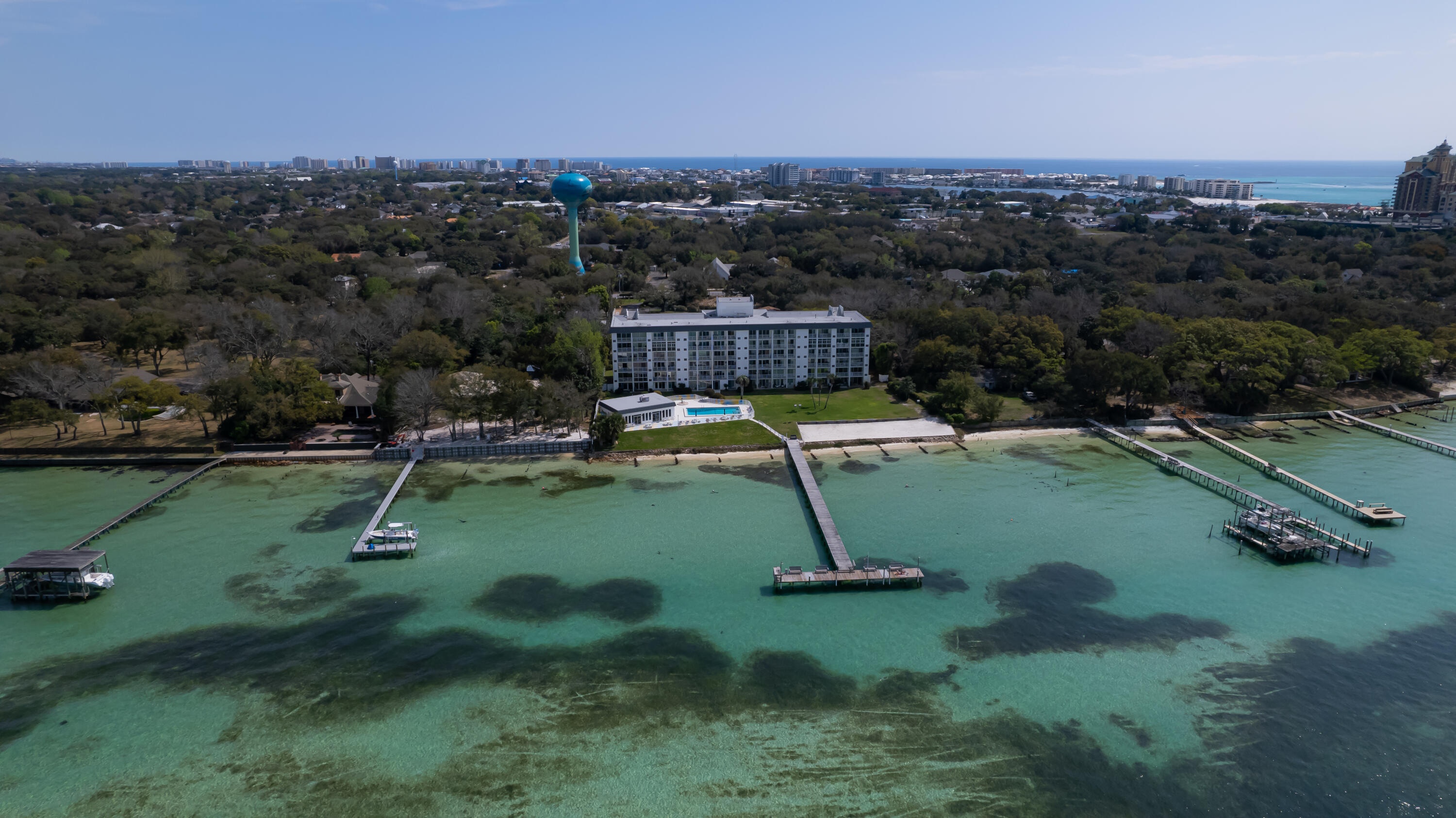 151 Calhoun Avenue, Unit 201 Destin, FL 32541 - Photo 32 of 55 an aerial view of a house with a swimming pool