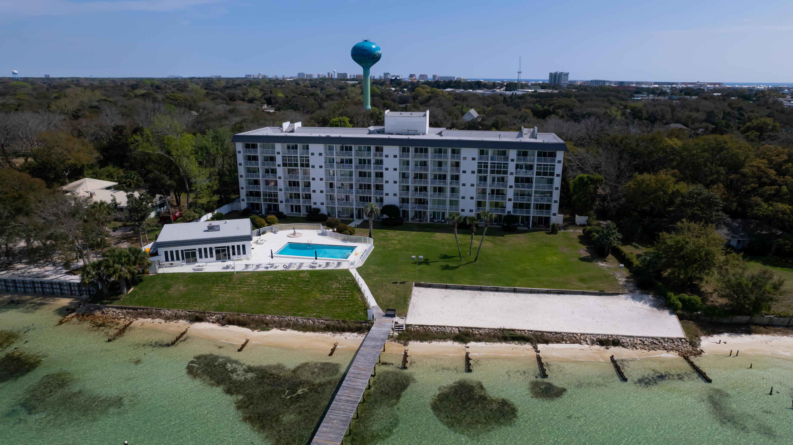 151 Calhoun Avenue, Unit 201 Destin, FL 32541 - Photo 34 of 55 an aerial view of a house having yard