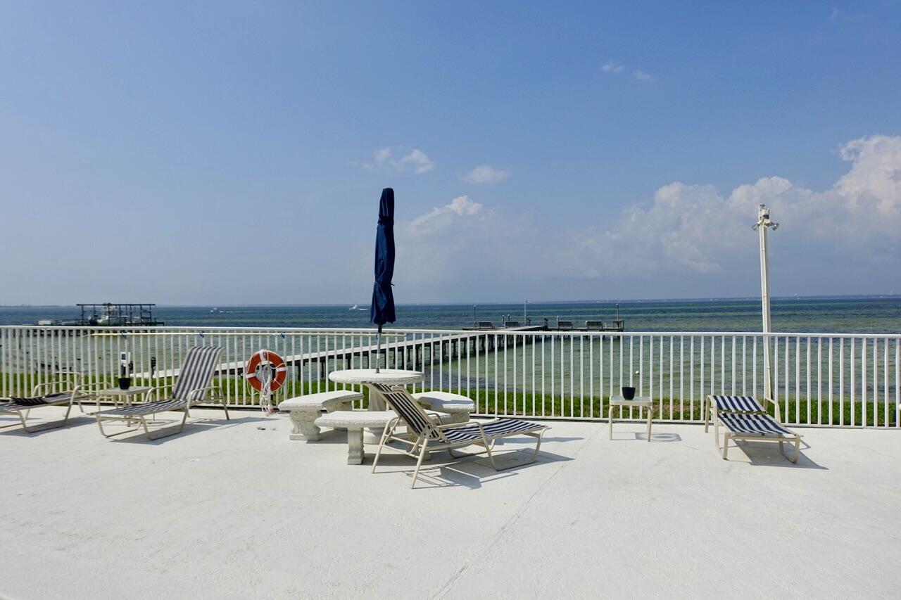 151 Calhoun Avenue, Unit 201 Destin, FL 32541 - Photo 50 of 55 a view of swimming pool with seating space