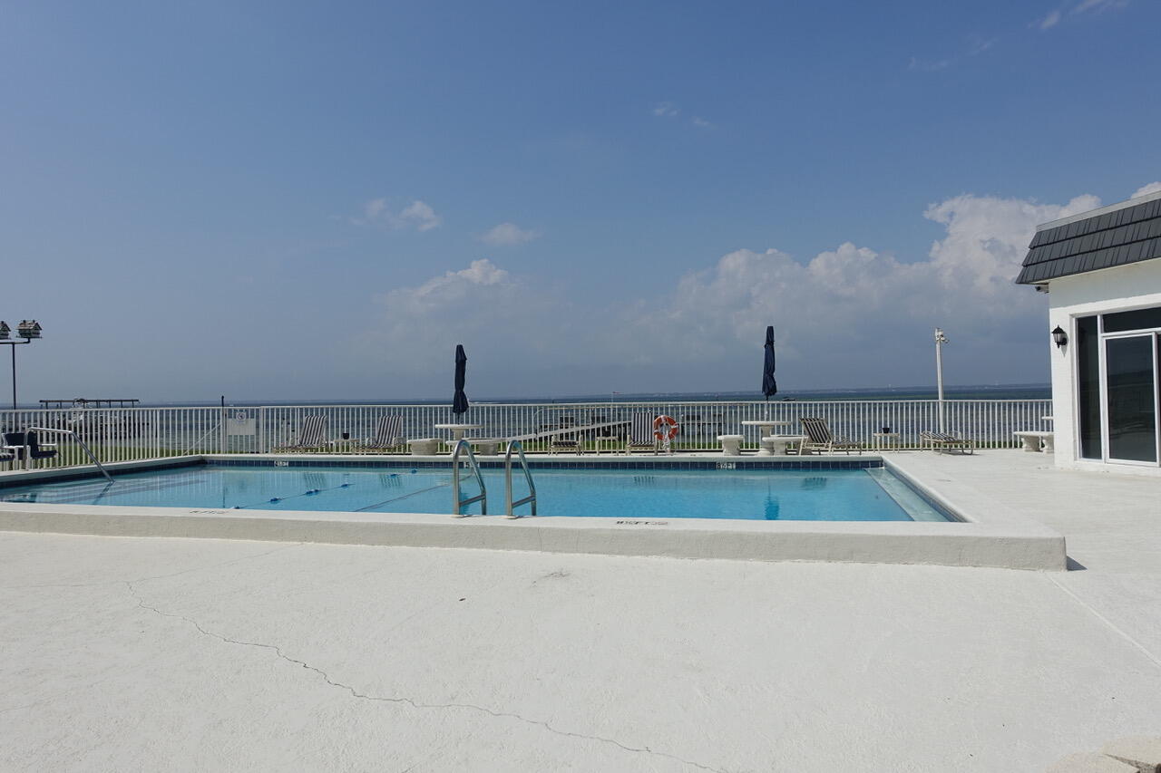 151 Calhoun Avenue, Unit 201 Destin, FL 32541 - Photo 52 of 55 a view of a swimming pool and an outdoor space