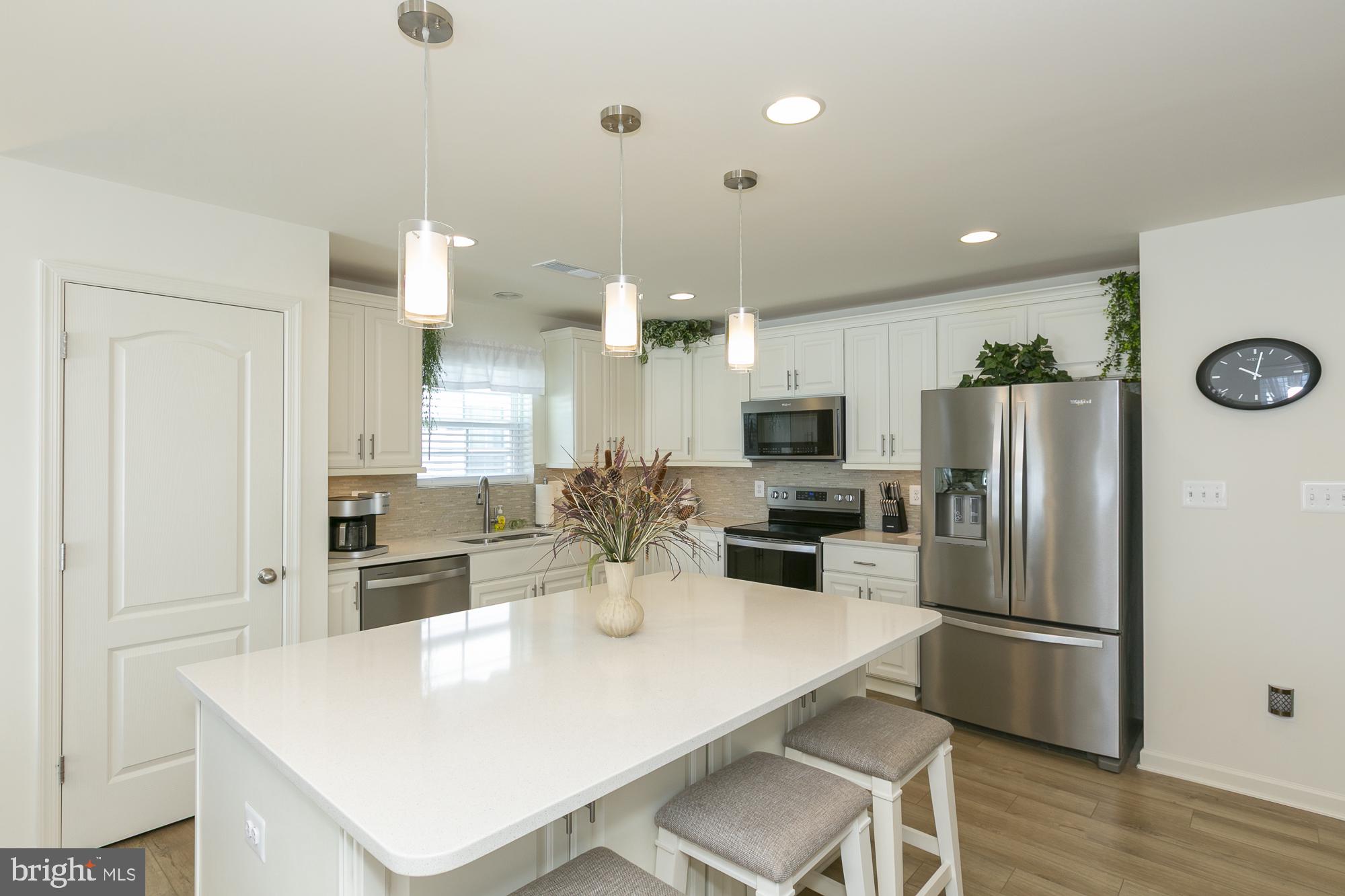 51 Ludgate Manor Falling Waters, WV 25419 - Photo 16 of 59 Modern kitchen with sleek finishes.