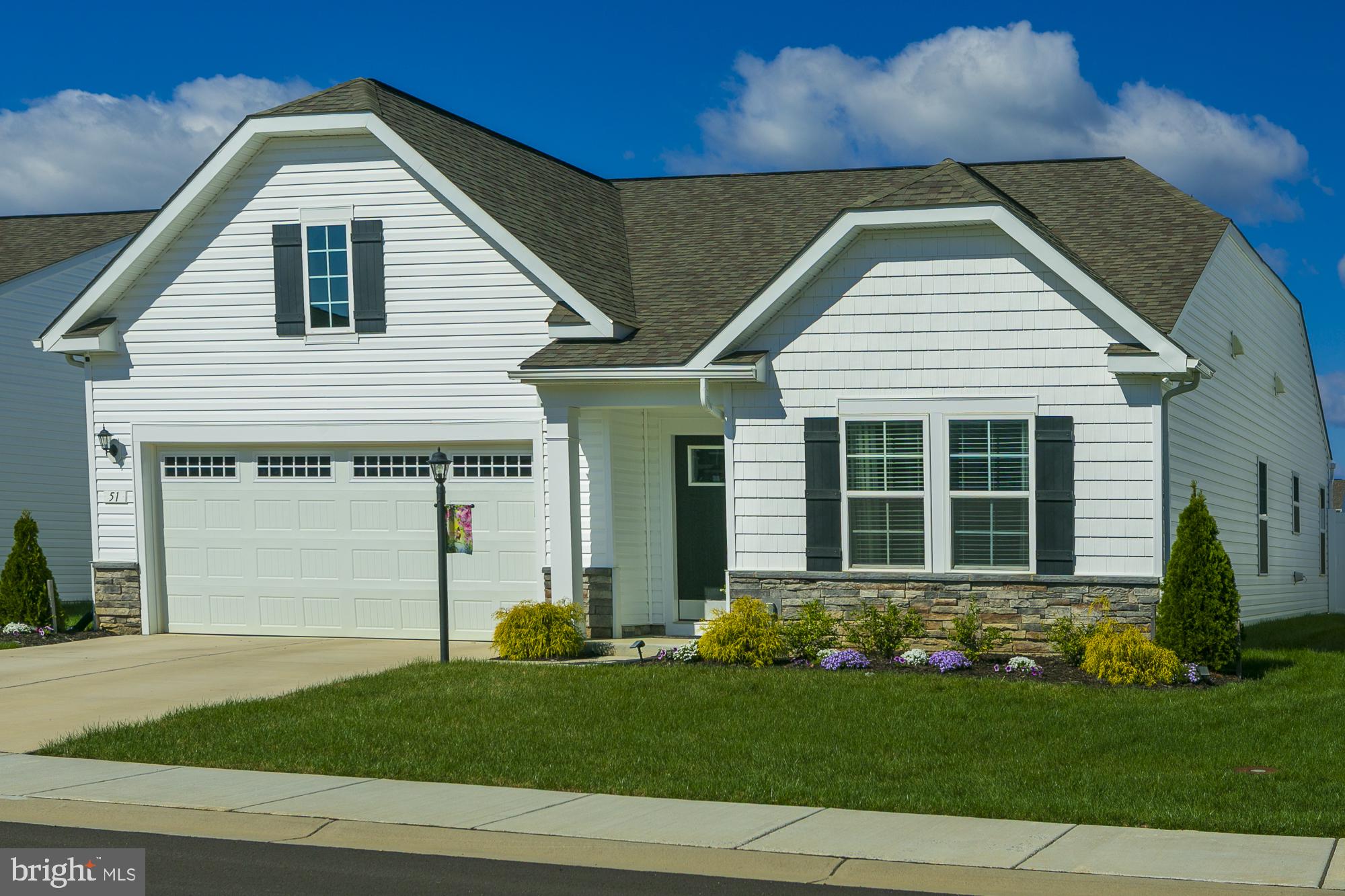 51 Ludgate Manor Falling Waters, WV 25419 - Photo 2 of 59 Charming home with vibrant landscaping.