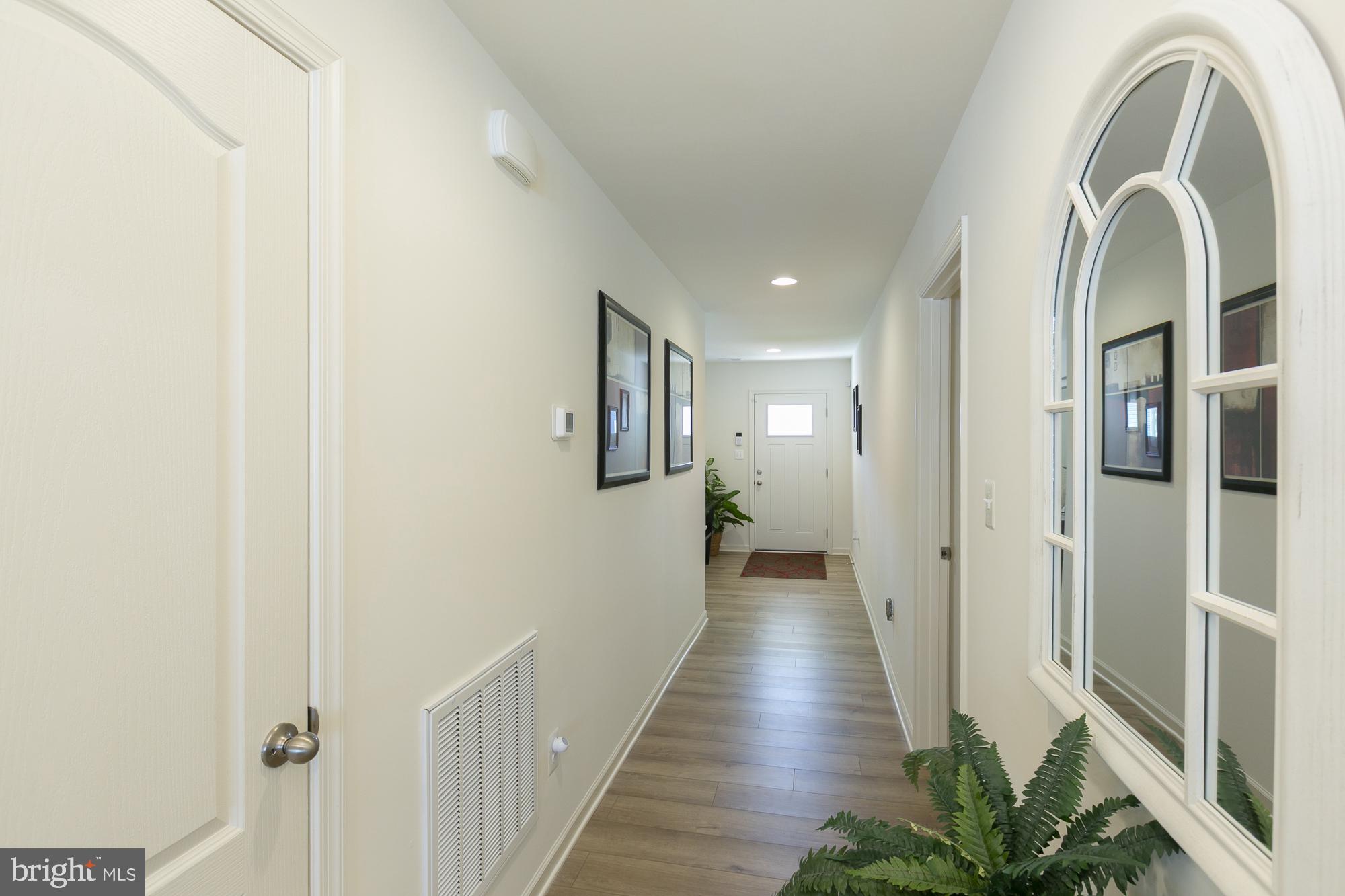 51 Ludgate Manor Falling Waters, WV 25419 - Photo 4 of 59 Inviting hallway with natural light.