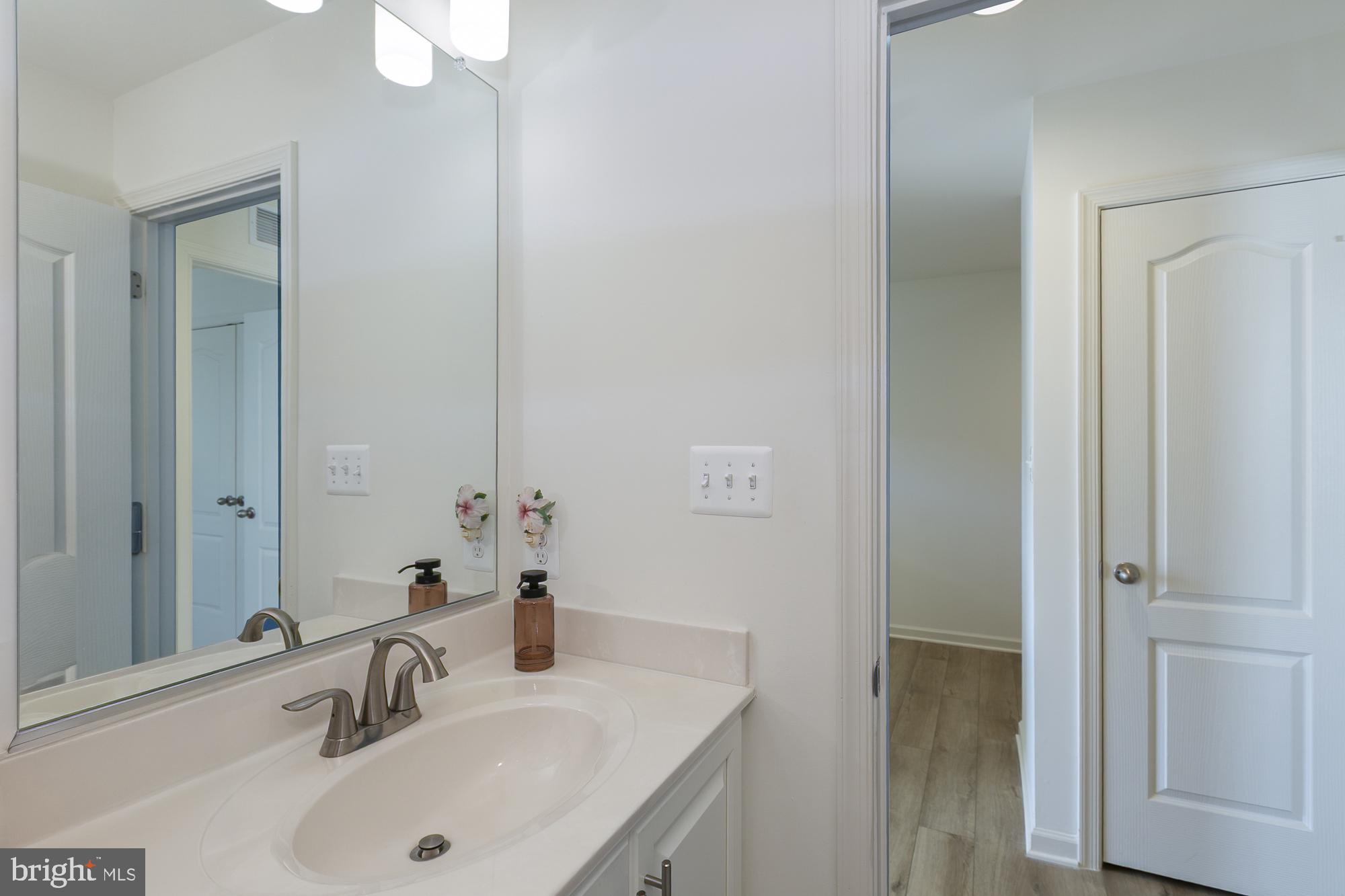 51 Ludgate Manor Falling Waters, WV 25419 - Photo 42 of 59 Sleek and modern bathroom retreat.