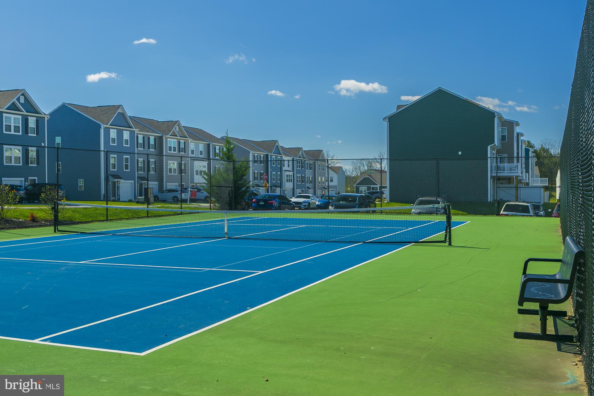 51 Ludgate Manor Falling Waters, WV 25419 - Photo 56 of 59 Vibrant tennis court in sunny setting.
