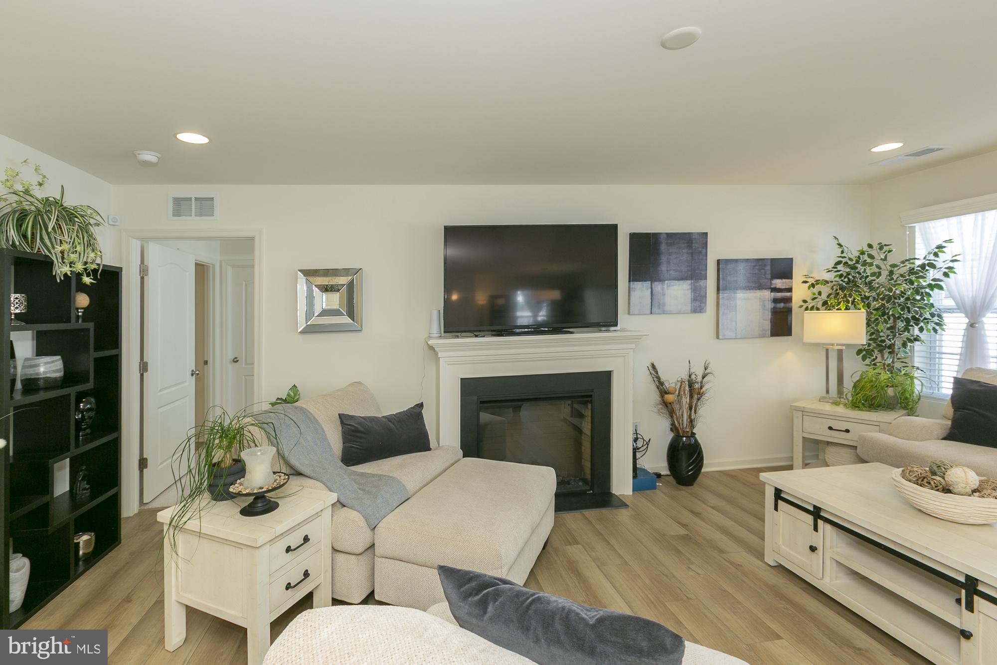 51 Ludgate Manor Falling Waters, WV 25419 - Photo 7 of 59 Cozy living space with modern charm.