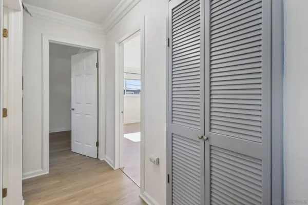 a view of a bathroom from the hallway