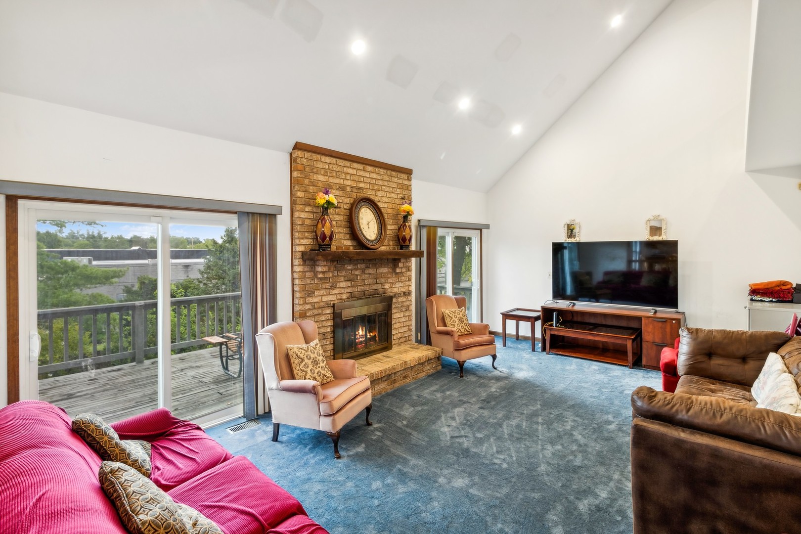 1605 Charlemagne Drive Hoffman Estates, IL 60192 - Photo 11 of 29 a living room with furniture and a flat screen tv