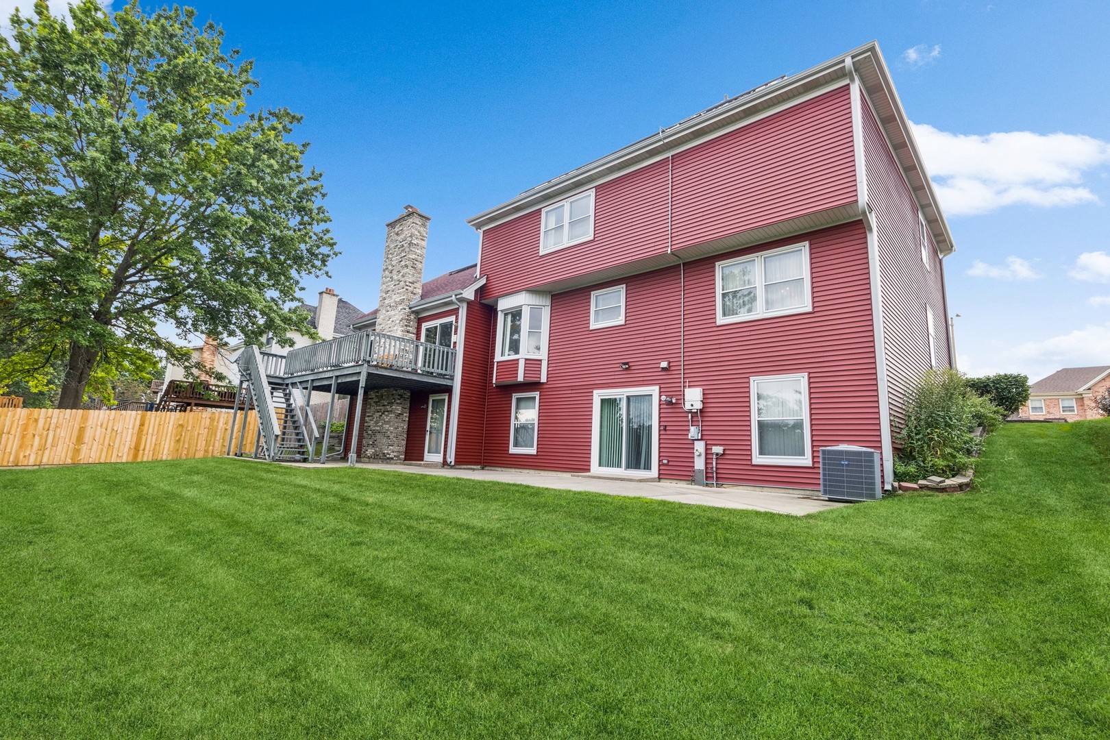 1605 Charlemagne Drive Hoffman Estates, IL 60192 - Photo 4 of 29 a view of a house with a yard